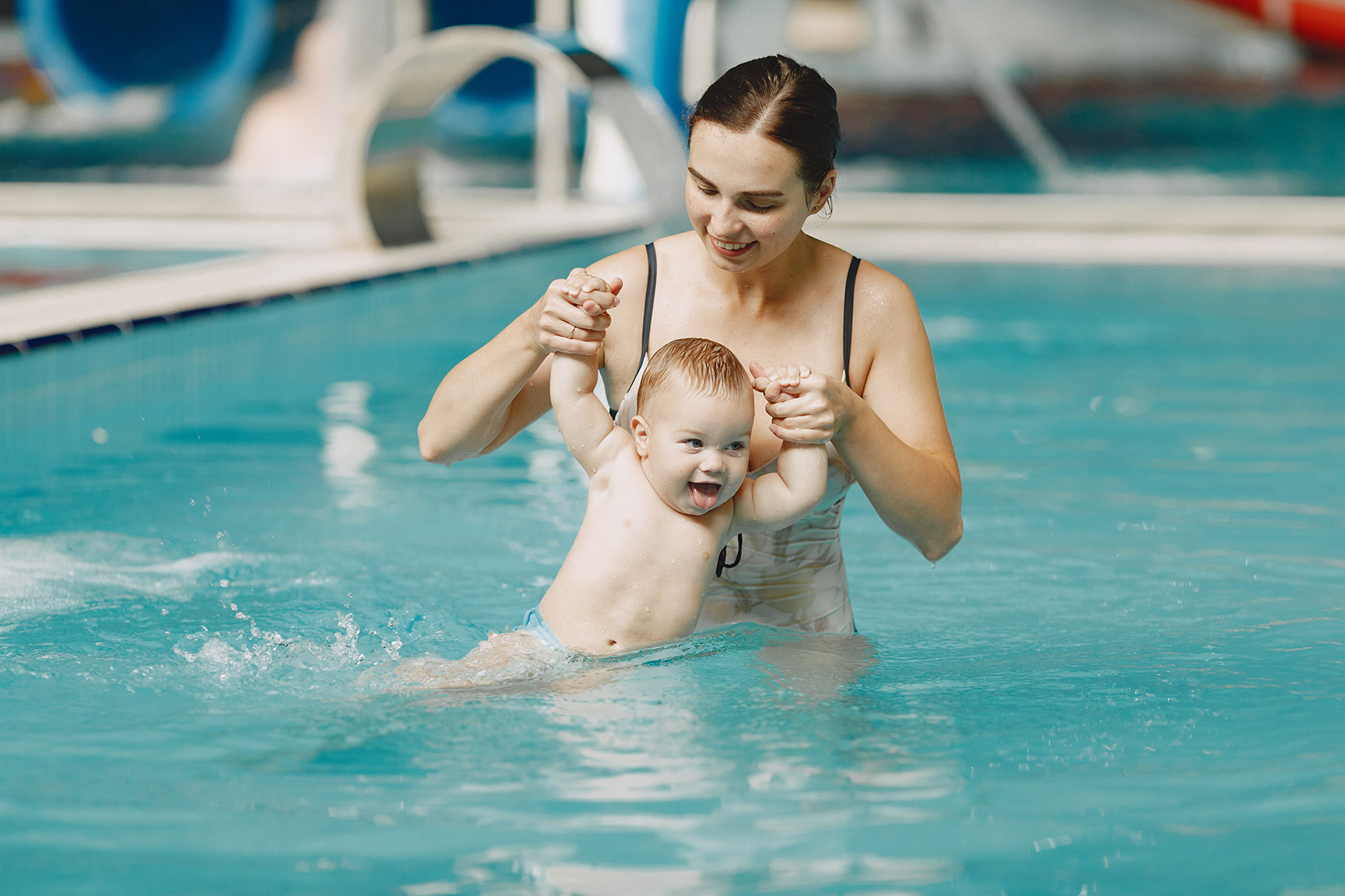 little-cute-baby-boy-mother-with-son-family-playing-in-water